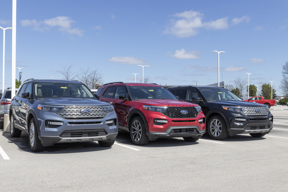 A Line Up of Ford Trucks including the 2021 Ford Explorer